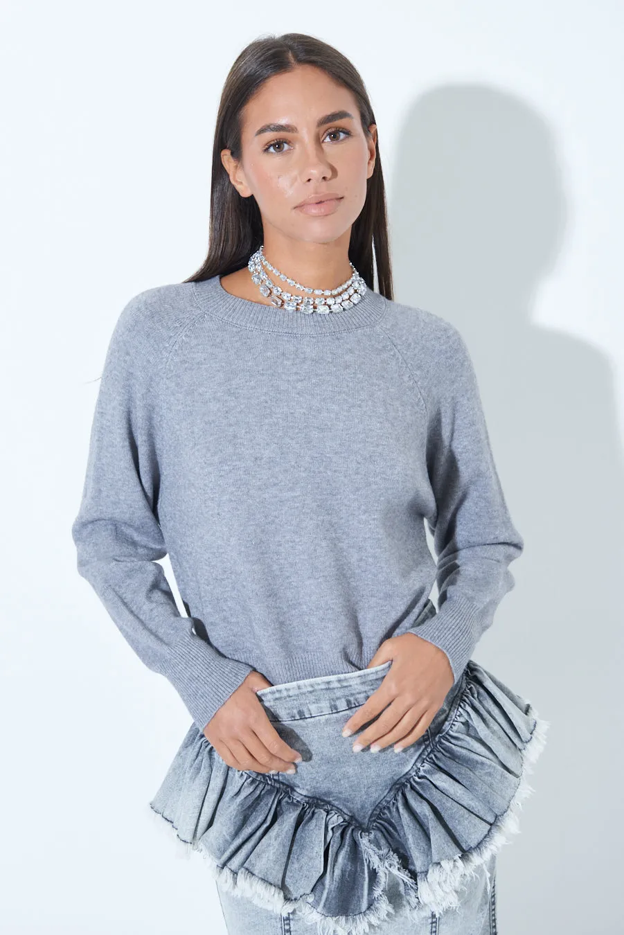 Relaxed fit knit sweater with ribbed cuffs wholesale